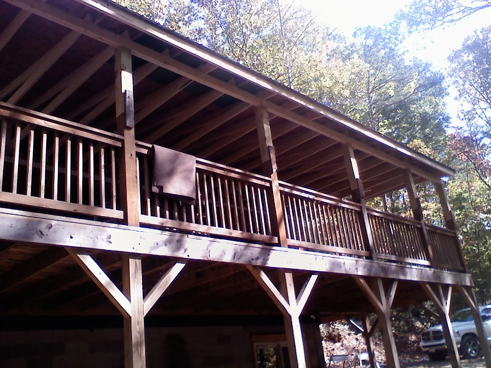 Timber framing under a new elevated porch and deck — Roof Leak Repair in West Stockbridge by Roofing Brothers